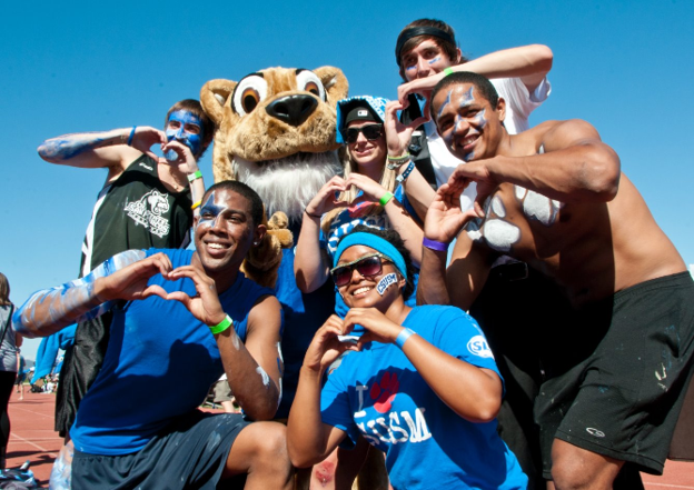 Crash the Cougar with students in spirit gear